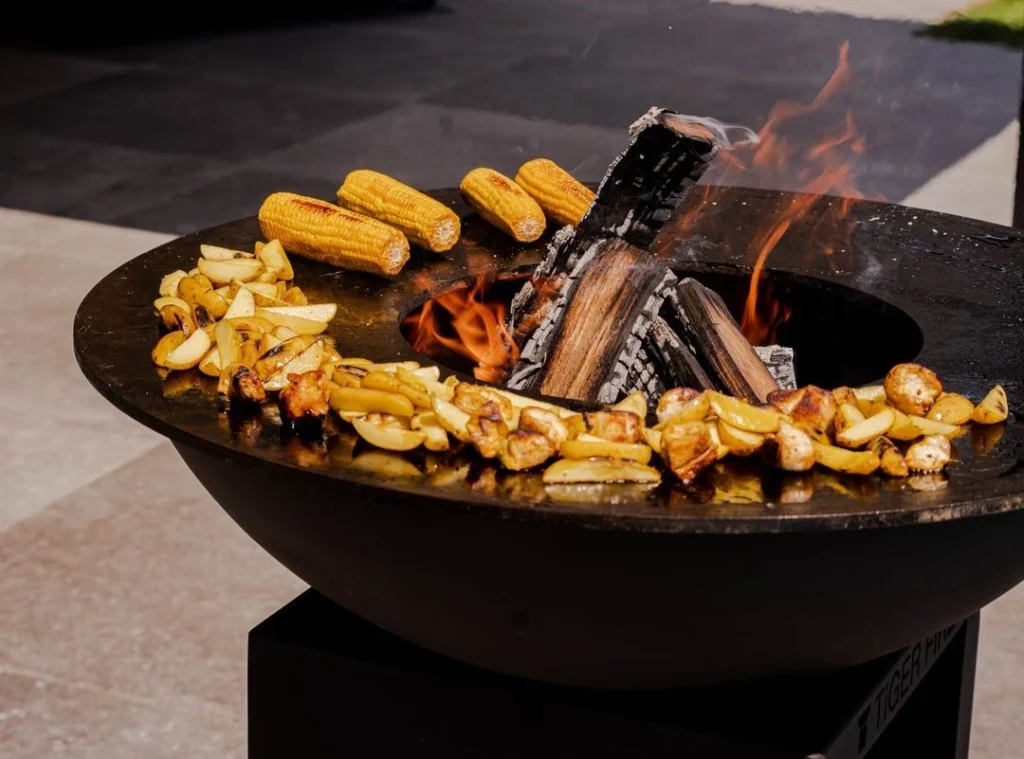 Onze TIGER FIRE plancha BBQ's combineren uitstekende kwaliteit met een stijlvol design, ideaal voor Nederlandse buitenkeukens. Plancha BBQ kopen Nederland | BBQ kopen Nederland | Barbecue kopen Nederland | TIGER FIRE OFFICIAL STORE | TIGER FIRE SHOP | TIGER FIRE | BBQ SHOP | PLANCHA BBQ | PLANCHA SHOP | GRILL PLANCHA BBQ | BBQ GRILL | PLANCHA GRILL BBQ | BBQ GRIDDLE | BESTE PLANCHA BBQ's VAN NEDERLAND | BUITENKEUKENS Nederland | HOUTVUUR PLANCHA | Plancha BBQ accessoires Nederland | BBQ buitenkeuken Nederland